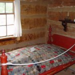 Bed inside BF Bird cabin in Nauvoo